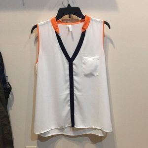 White tank top with orange and blue accents